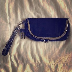 Black and silver GUESS clutch, NWT.
